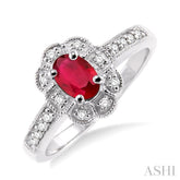 6x4 MM Oval Cut Ruby and 1/6 Ctw Single Cut Diamond Ring in 14K White Gold