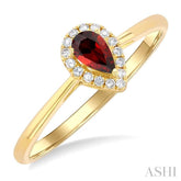 5x3 MM Pear Shape Garnet and 1/20 Ctw Single Cut Diamond Halo Semi-Precious Ring in 14K Yellow Gold