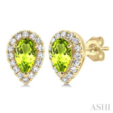 5x3 MM Pear Shape Peridot and 1/8 Ctw Single Cut Diamond Halo Semi-Precious Stud Earrings in 14K Yellow Gold