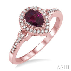 7x5 MM Pear Shape Rhodolite Garnet and 1/6 Ctw Round Cut Diamond Ring in 10K Rose Gold 7x5 MM Pear Shape Rhodolite Garnet and 1/6 Ctw Round Cut Diamond Ring in 10K Rose Gold