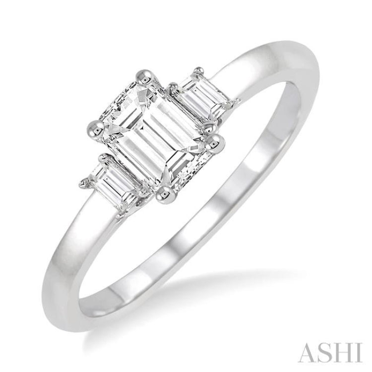 5/8 Ctw Emerald and Baguette Diamond Engagement Ring with 1/2 Ct Emerald cut Center Stone in 14K White Gold 5/8 Ctw Emerald and Baguette Diamond Engagement Ring with 1/2 Ct Emerald cut Center Stone in 14K White Gold