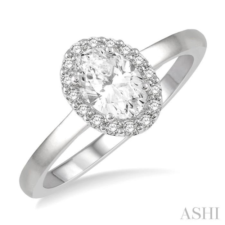 1/3 Ctw Round Cut Diamond Halo Engagement Ring With 1/4 Ct Oval Cut Center Stone in 14K White Gold 1/3 Ctw Round Cut Diamond Halo Engagement Ring With 1/4 Ct Oval Cut Center Stone in 14K White Gold
