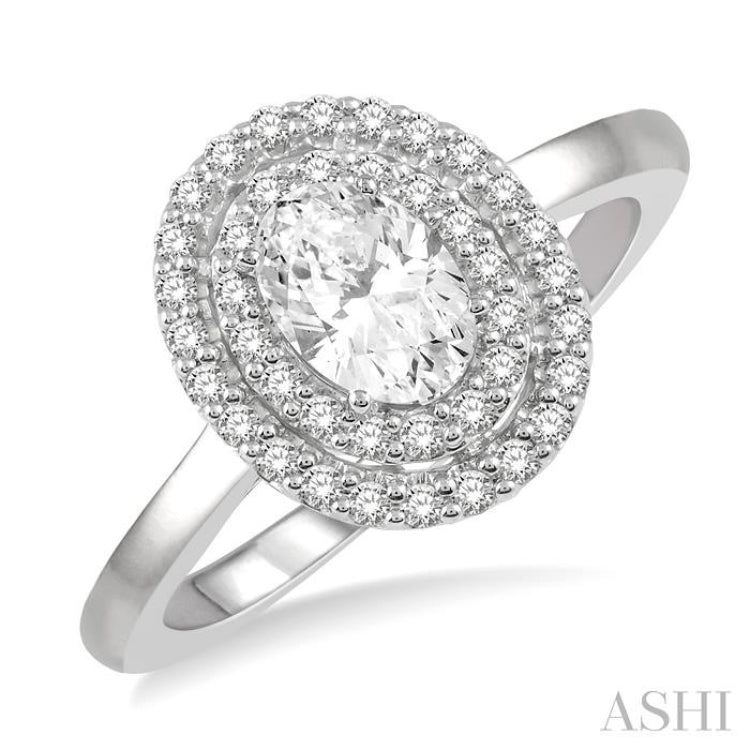 3/4 Ctw Round & Oval Cut Diamond Ladies Engagement Ring with 1/2 Ctw Oval Cut Center Stone in 14K White Gold 3/4 Ctw Round & Oval Cut Diamond Ladies Engagement Ring with 1/2 Ctw Oval Cut Center Stone in 14K White Gold