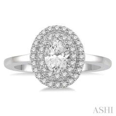3/4 Ctw Round & Oval Cut Diamond Ladies Engagement Ring with 1/2 Ctw Oval Cut Center Stone in 14K White Gold 3/4 Ctw Round & Oval Cut Diamond Ladies Engagement Ring with 1/2 Ctw Oval Cut Center Stone in 14K White Gold