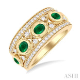 4x3 MM Oval and 2.8 MM Round Cut Emerald and 3/8 Ctw Curvy Criss-Cross Single Cut Diamond Precious Band in 14K Yellow Gold
