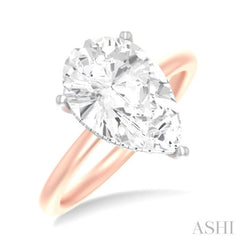 1/8 ctw Pear Shape Round Cut Diamond Semi Mount Engagement Ring in 14K Rose and White Gold