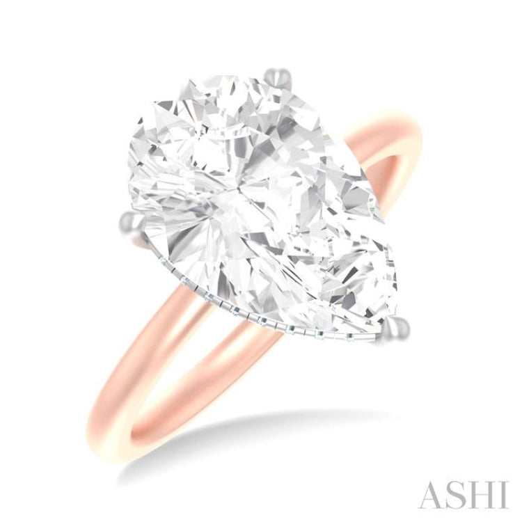1/8 ctw Pear Shape Round Cut Diamond Semi Mount Engagement Ring in 14K Rose and White Gold