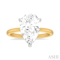 1/8 ctw Pear Shape Round Cut Diamond Semi Mount Engagement Ring in 14K Yellow and White Gold