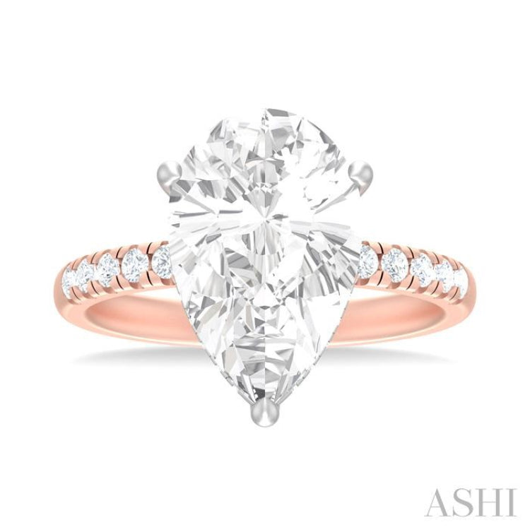 1/3 ctw Pear Shape Round Cut Diamond Semi Mount Engagement Ring in 14K Rose and White Gold