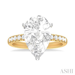 1/3 ctw Pear Shape Round Cut Diamond Semi Mount Engagement Ring in 14K Yellow and White Gold