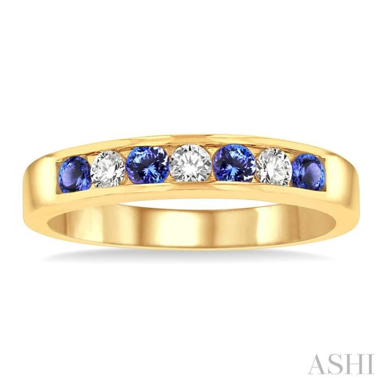 2.5 MM Round Cut Tanzanite and 1/5 ctw Channel Set Round Cut Diamond Band in 14K Yellow Gold