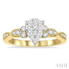 1/2 Ctw Pear Shape Center Criss-Cross Carved Shank Lovebright Round Cut Diamond Engagement Ring in 14K Yellow and White Gold