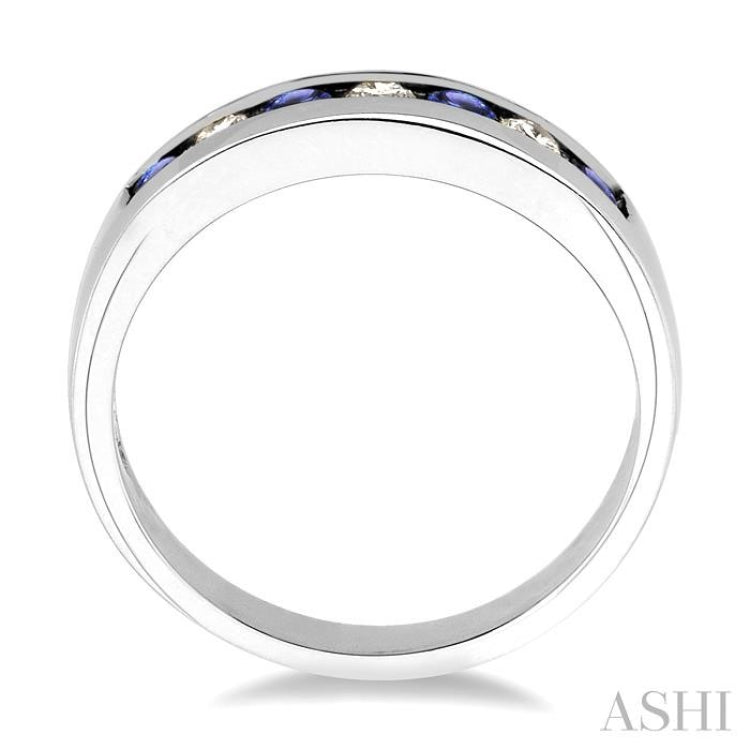 2.5 MM Round Cut Tanzanite and 1/5 Ctw Channel Set Round Cut Diamond Band in 14K White Gold