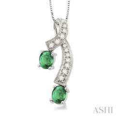 5x4 MM Oval Cut Emerald and 1/6 Ctw Round Cut Diamond Precious Pendant in 14K White Gold with Chain