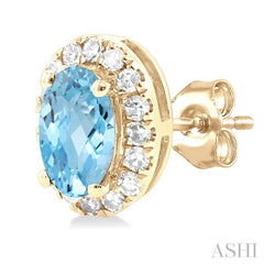 5x3 MM Oval Shape Aquamarine and 1/8 Ctw Single Cut Diamond Halo Semi-Precious Stud Earrings in 14K Yellow Gold