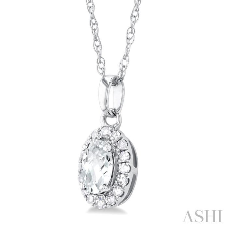 5x3 MM Oval Shape White Topaz and 1/20 Ctw Single Cut Diamond Halo Semi-Precious Pendant with Chain in 10K White Gold