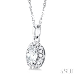 5x3 MM Oval Shape White Topaz and 1/20 Ctw Single Cut Diamond Halo Semi-Precious Pendant with Chain in 10K White Gold