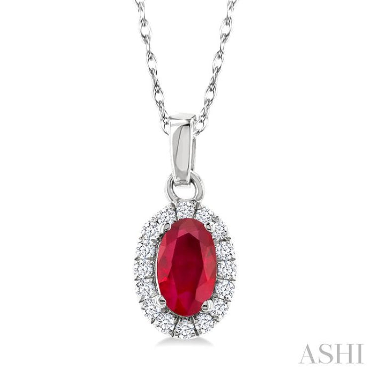 5x3 MM Oval Shape Ruby and 1/20 Ctw Round Cut Diamond Halo Precious Pendant with Chain in 10K White Gold