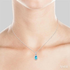 5x3 MM Oval Shape Blue Topaz and 1/20 Ctw Single Cut Diamond Halo Semi-Precious Pendant with Chain in 10K White Gold