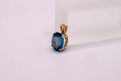 14k Yellow Gold and approx 4.5 cttw Blue Topaz Pendant