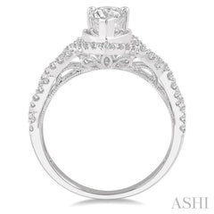 3/4 Ctw Intertwined Shank Round Cut Diamond Ladies Engagement Ring with 3/8 Ct Pear Shaped Center Stone in 14K White Gold