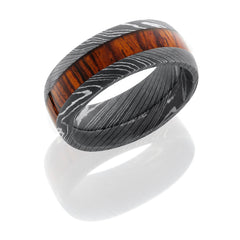 Damascus Steel 9 mm domed band with a acid finish and a natural Mexican Cocobolo burl wood inlay.