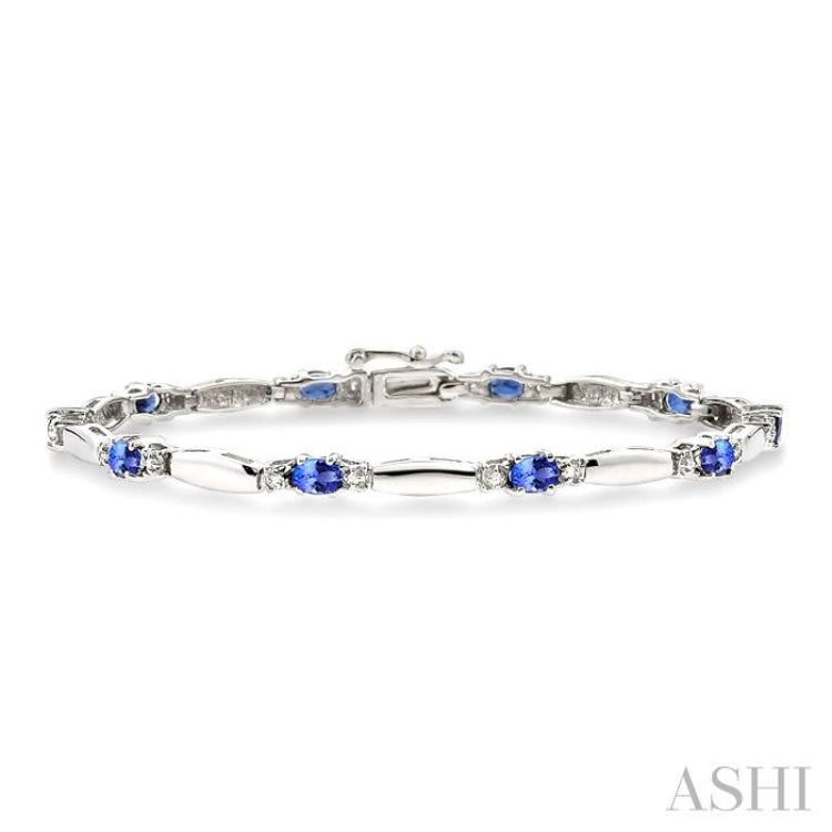 5x3 MM Oval Cut Tanzanite and 1/10 ctw Bar and Oval Mount Round Cut Diamond  Precious Bracelet in 10K White Gold