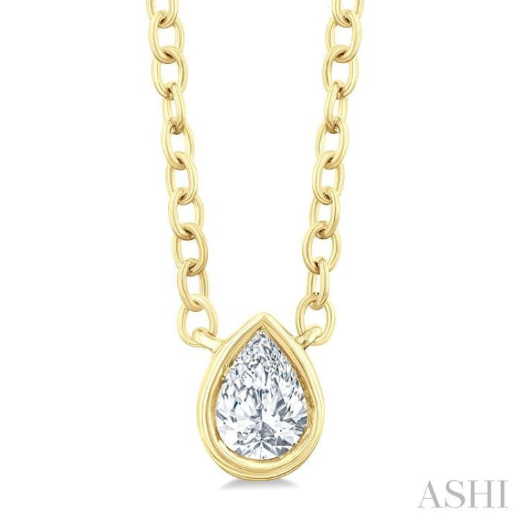 1/6 ctw Petite Bezel Set Pear Cut Diamond Fashion Pendant With Chain in 10K Yellow Gold