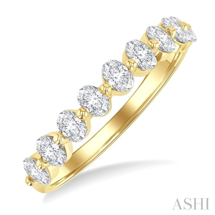3/4 ctw Half Eternity Oval Cut Diamond Fashion Band in 14K Yellow Gold