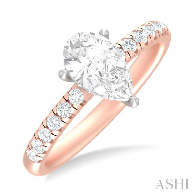 1/3 ctw Pear Shape Round Cut Diamond Semi Mount Engagement Ring in 14K Rose and White Gold