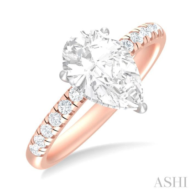 1/3 ctw Pear Shape Round Cut Diamond Semi Mount Engagement Ring in 14K Rose and White Gold