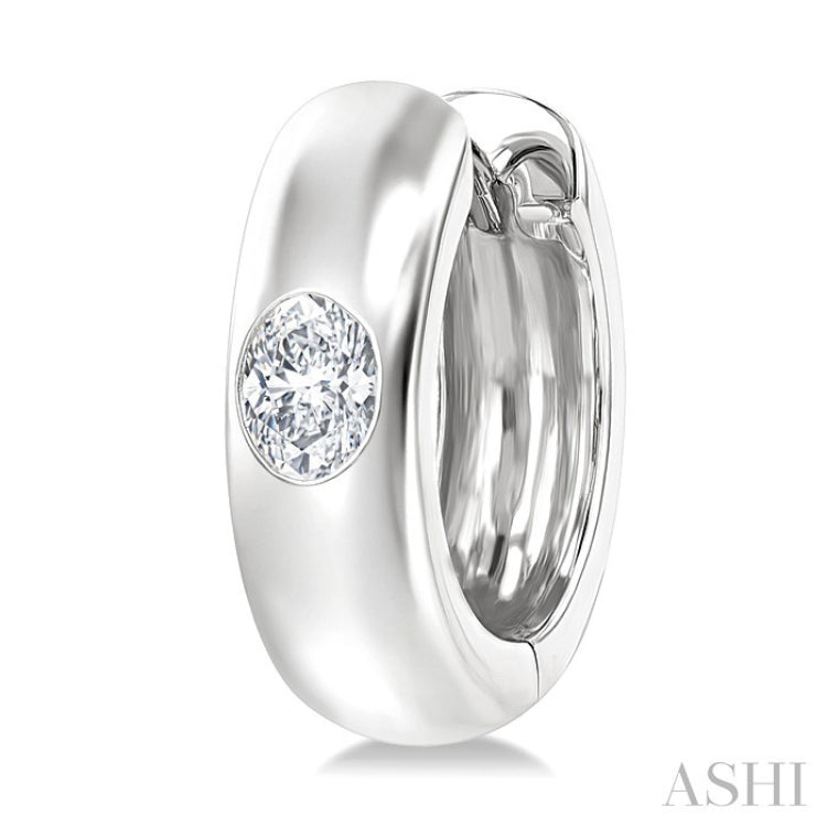 1/3 Ctw Bezel Set Oval Cut Diamond Fashion Huggie Earrings in 14K White Gold