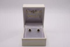 Ostbye 14k yellow gold lab bezel sapphire earring