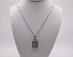 Sterling silver and crystal filigree pendant