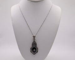 Sterling silver and onyx filigree pendant