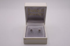 14k white topaz studs