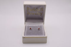 14k yellow gold baby earrings - Garnet