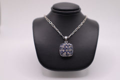 Sterling silver white and blue sapphire pendant